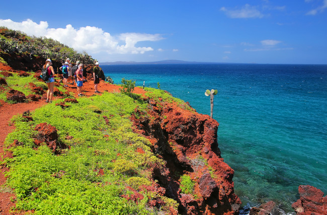 RABIDA ISLAND, ECUADOR -APRIL 22: Unidentified people visit Rabida Island on April 22, 2015 in Galapagos National Park, Ecuador. Galapagos Islands are UNESCO World Heritage Site