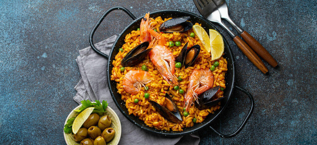 https://www.luxurylifestylemag.co.uk/wp-content/uploads/2021/09/bigstock-Classic-Dish-Of-Spain-Seafood-405111209-1024x470.jpg