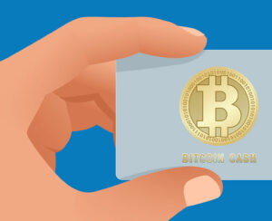 Save Download Preview A man s hand holds a Bitcoin debit card