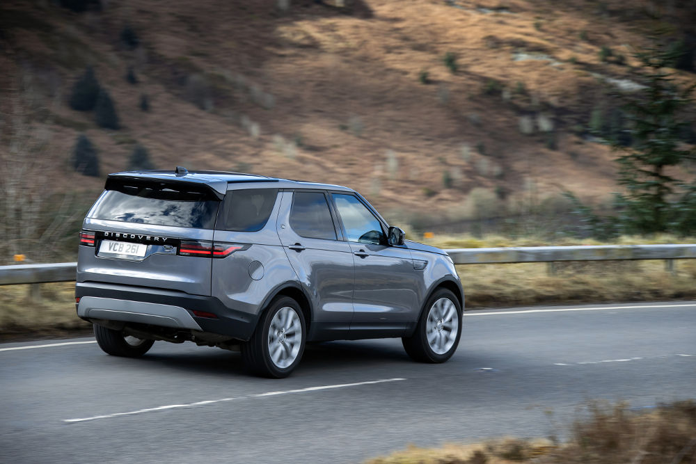 Land Rover Discovery D300 on road side view from rear