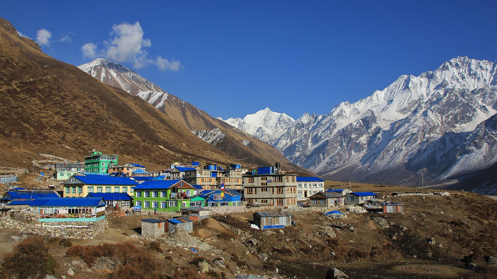Beautiful landscape in the Langtang valley, Nepal. Snow covered mountains and village Kyanjin Gumba.