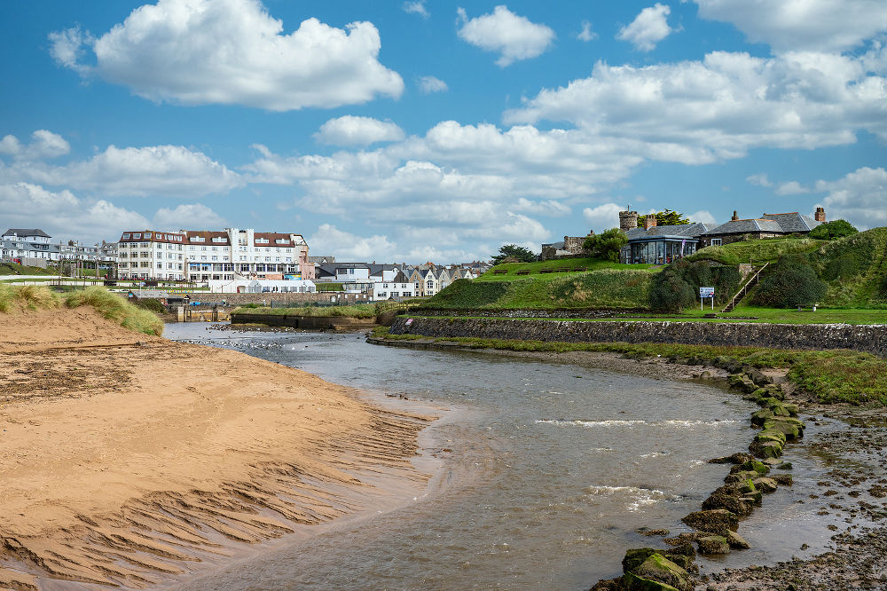 Low tide around the castle museum and tea shop in Bude