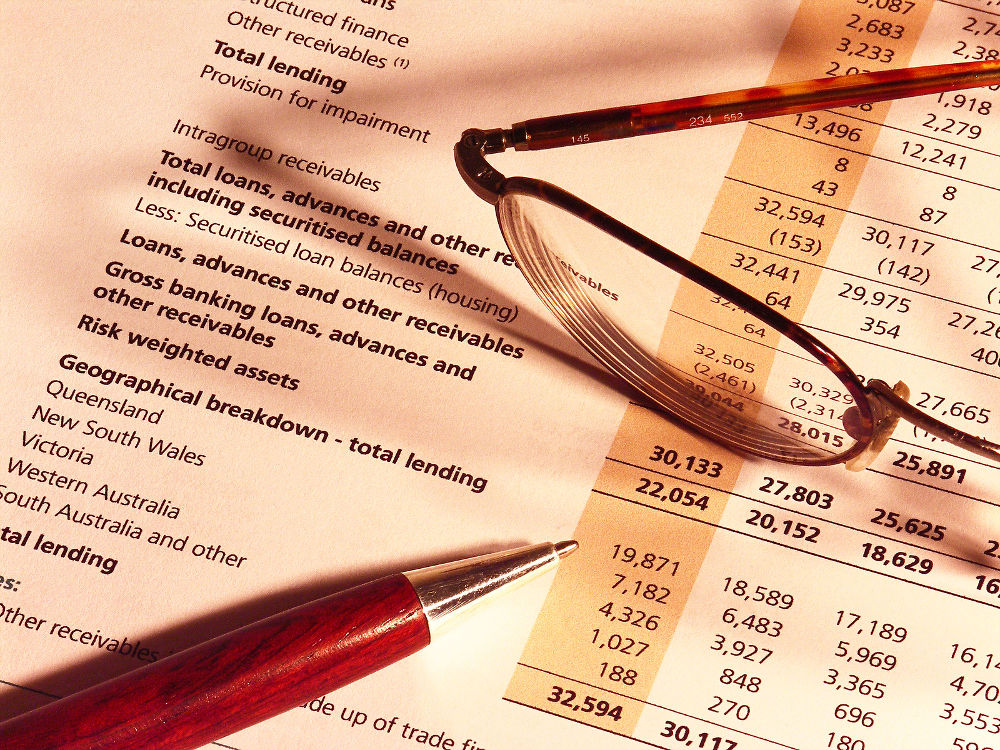 Financial results, glasses and pen