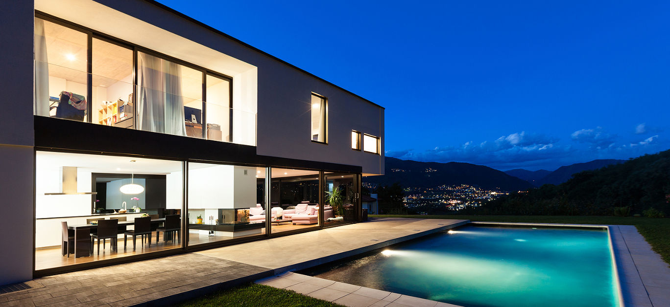 Modern villa with pool, night scene