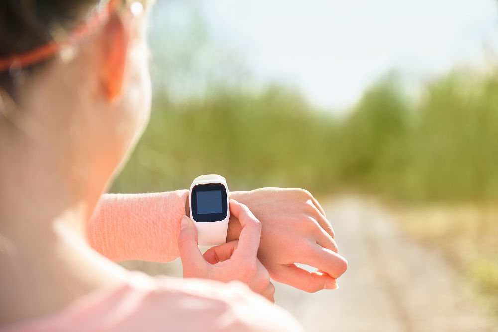 Smart watch for sport. Athlete wearing heart rate monitor