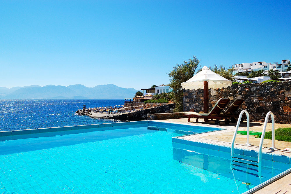 Swimming pool at luxury villa Crete Greece