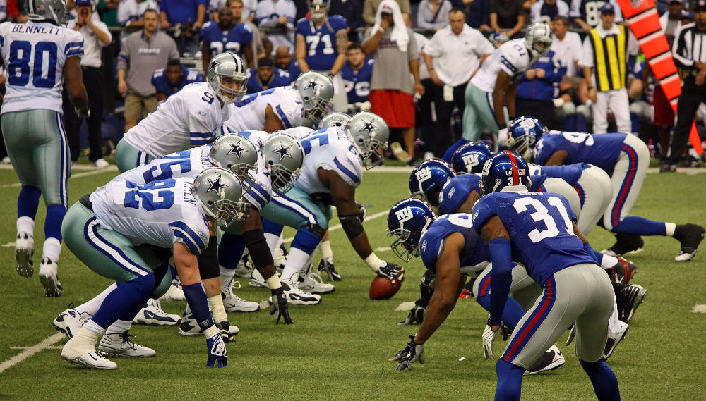 Tony Romo and the Dallas Cowboys lineup against the NY Giants