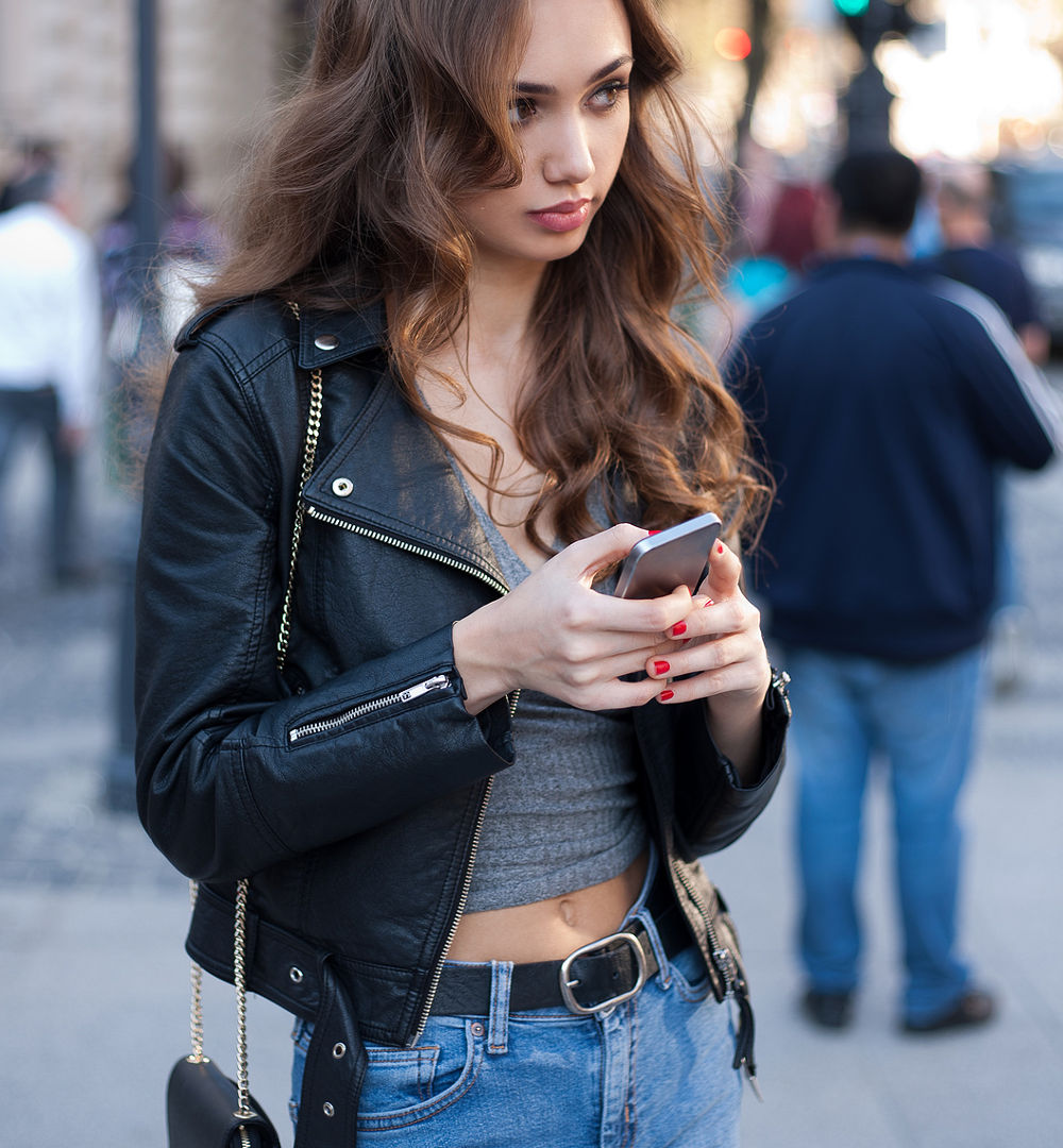 Gorgeous fashionable sexy young brunette woman street portraits.