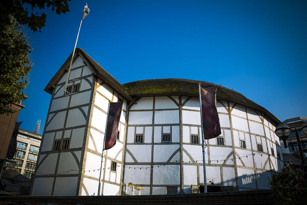 The Shakespearean theatre on the South Bank of the Thames with the Shard in the background