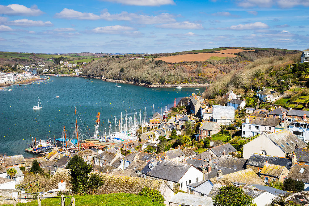 Path down to the village of Polruan Cornwall with Fowey on the opposite side of the river.