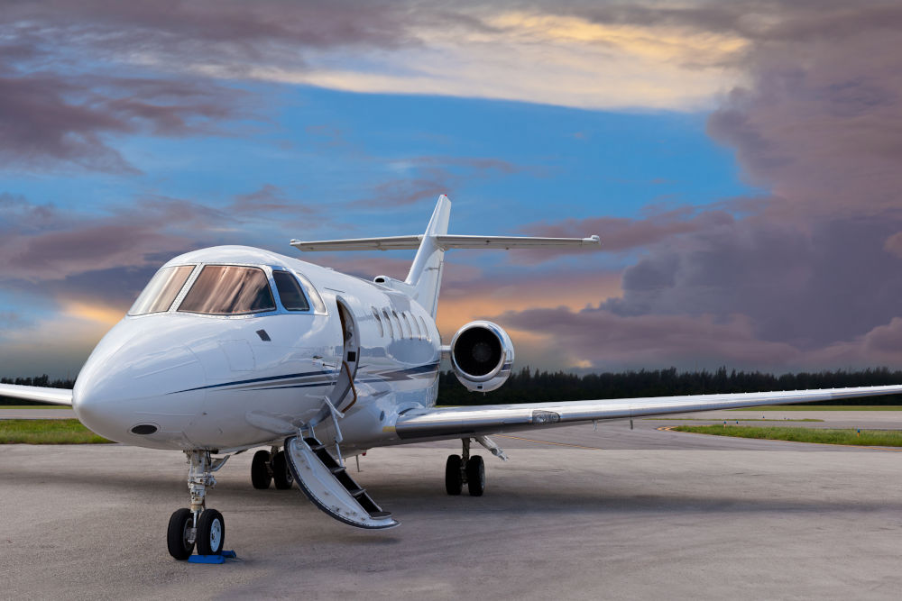 Private jet on the runway with the stair down