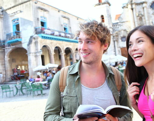 Tourists couple travel in Havana, Cuba having fun