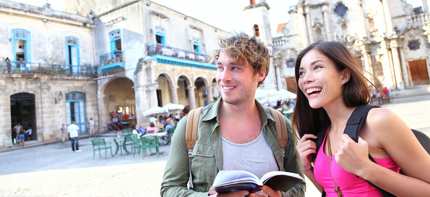 Tourists couple travel in Havana, Cuba having fun