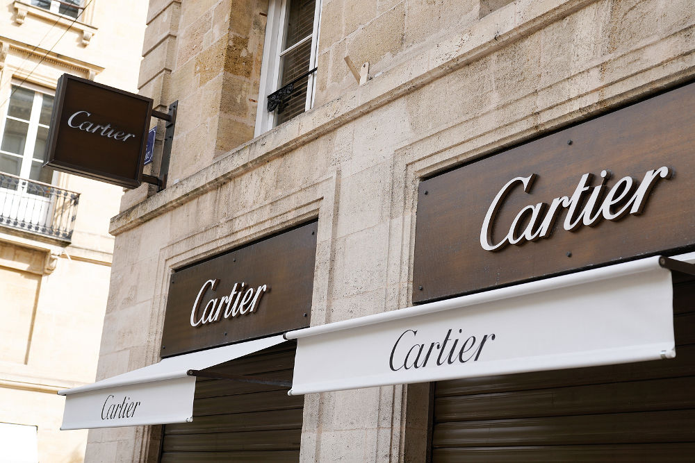 Cartier sign on the wall of the store