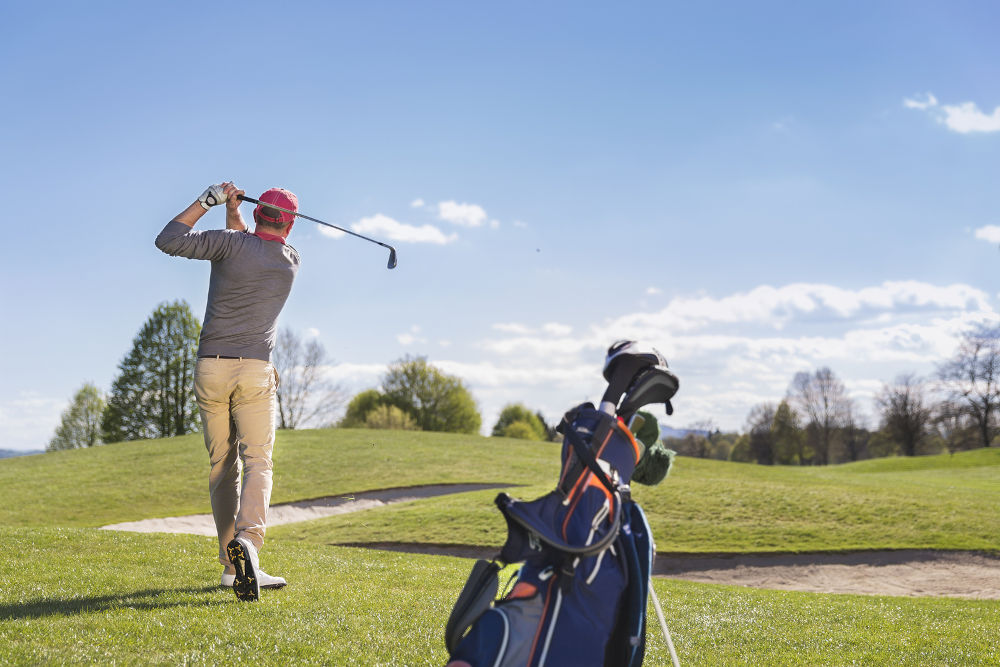 golfer taking a swing