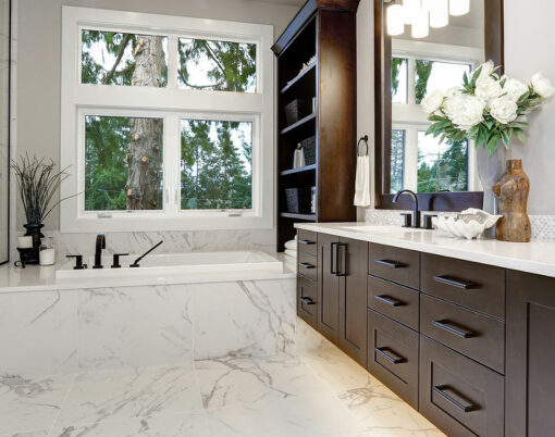 Bathroom modern interior with dark hardwood cabinets and large mirror