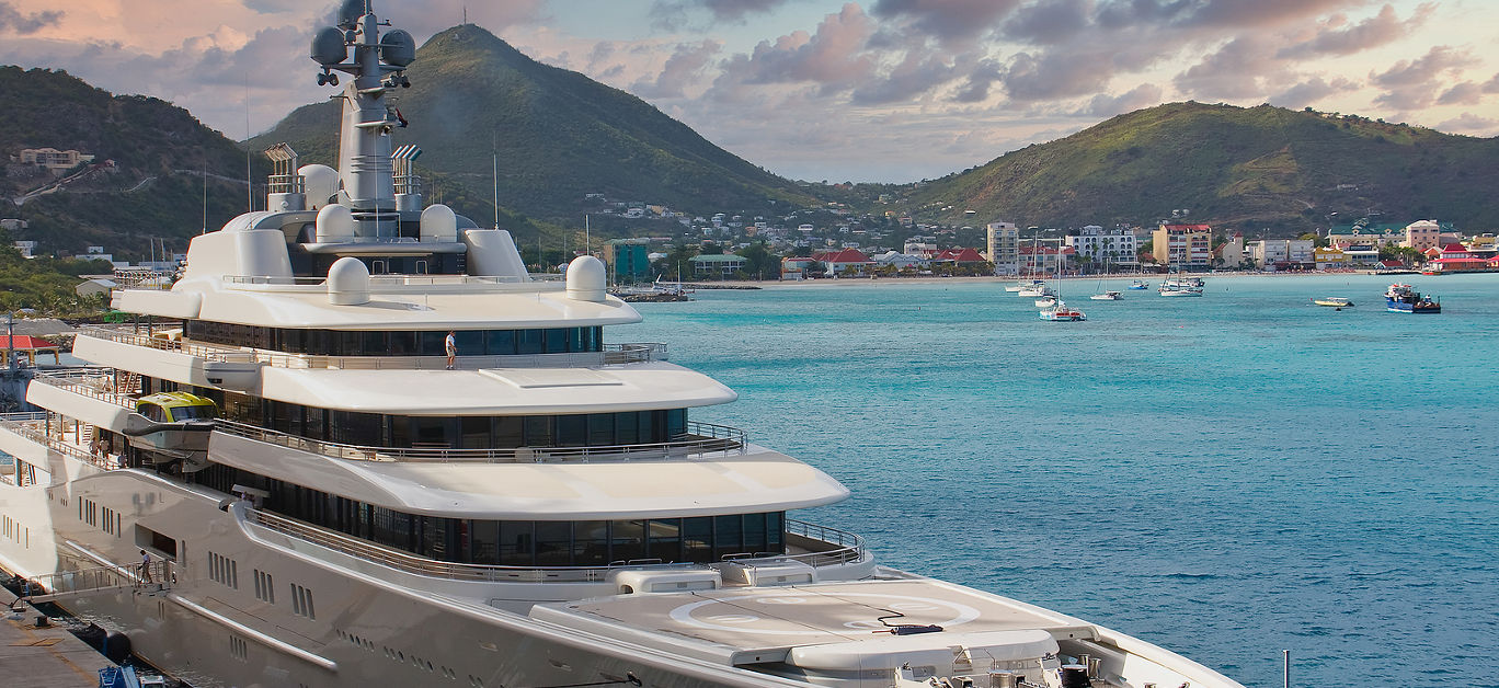 A huge private luxury yacht at a pier in St. Martin