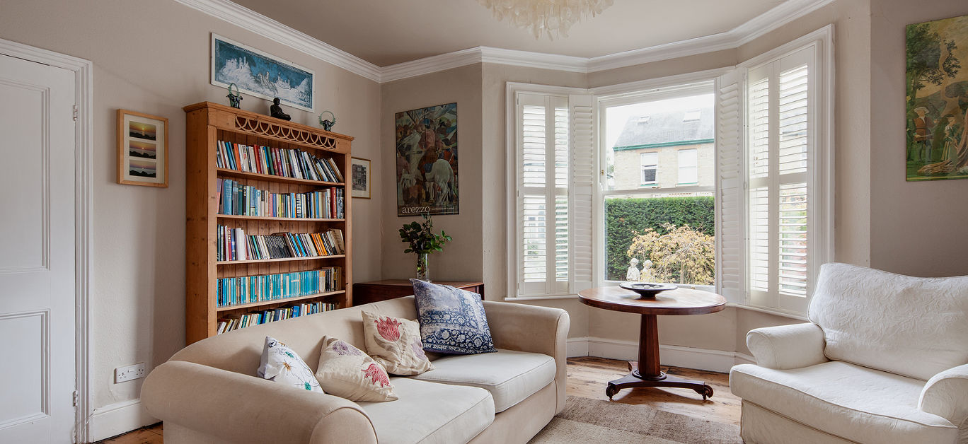 Luxury traditional furnished victorian living room with modern furniture bay window