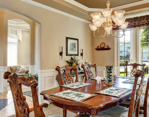 Gorgeous dining room interior design with vintage furniture french windows