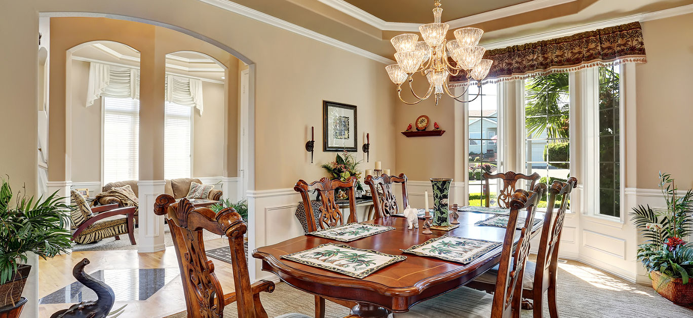 Gorgeous dining room interior design with vintage furniture french windows