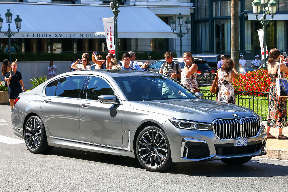 Luxury saloon car BMW 7-series (G12) in the city street near the casino.