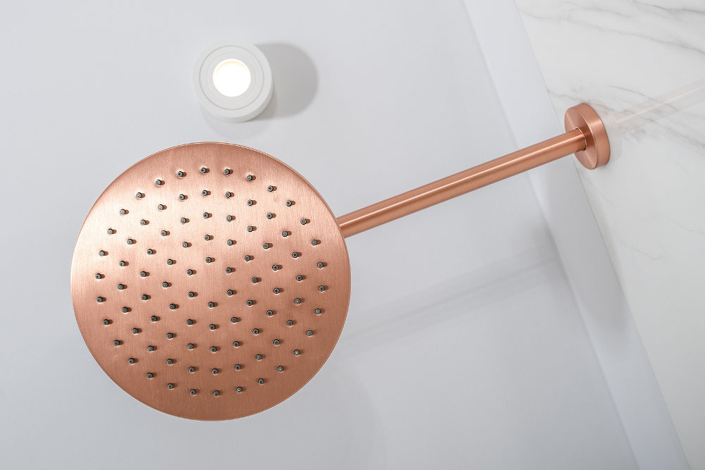 Stylish Copper Shower Head Closeup. Elegant and Modern Bathroom Interior.