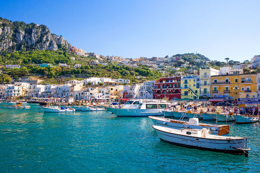 Boat for tourists in the Marina Grande harbor