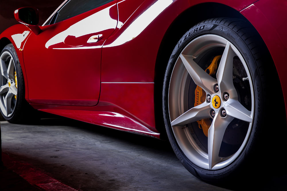 Close-up of Wheel of Red Ferrari Sports Car