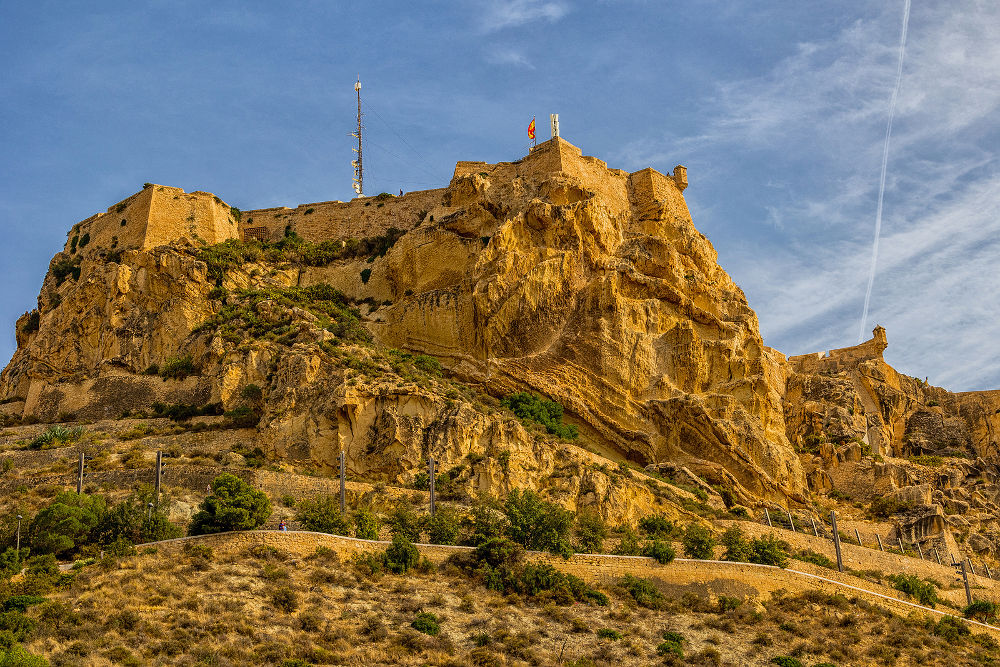 beautiful castle of saint barbara in alicante spain against blue sky landmark