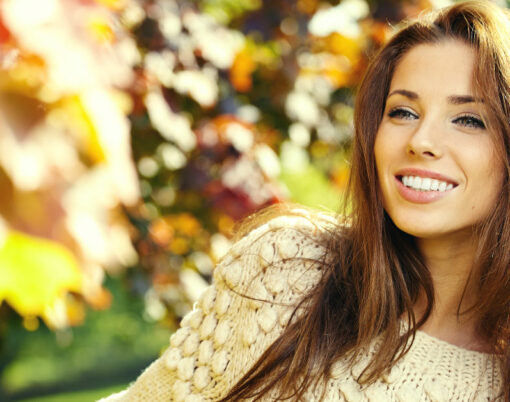 autumn woman on leafs background