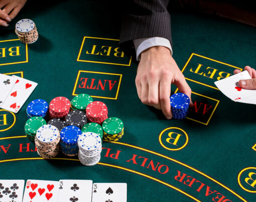 couple playing poker at the table.