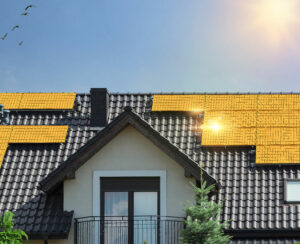 Golden solar panels on roof of beautiful modern house. Concept of saving money