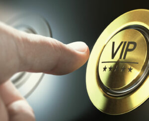 Man with private access to VIP services pressing a button to ask a concierge