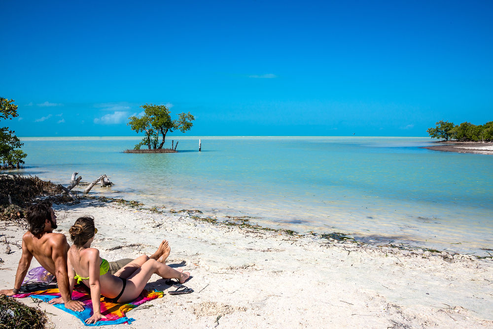 Beautiful scene. Couple enjoying nature at Holbox tropical island.