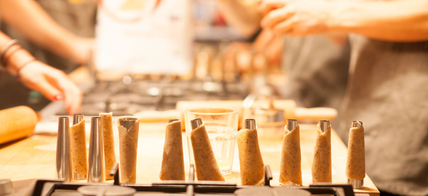 women making cannoli at workshop