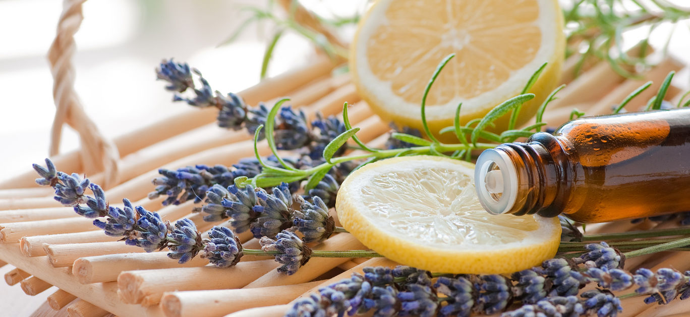 still life with natural essential oil bottle