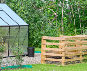 big garden compost and green house in garden