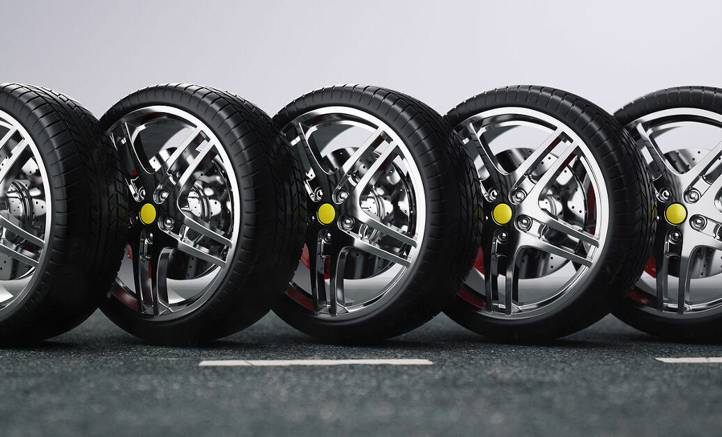 Car wheel, car tire standing on a road