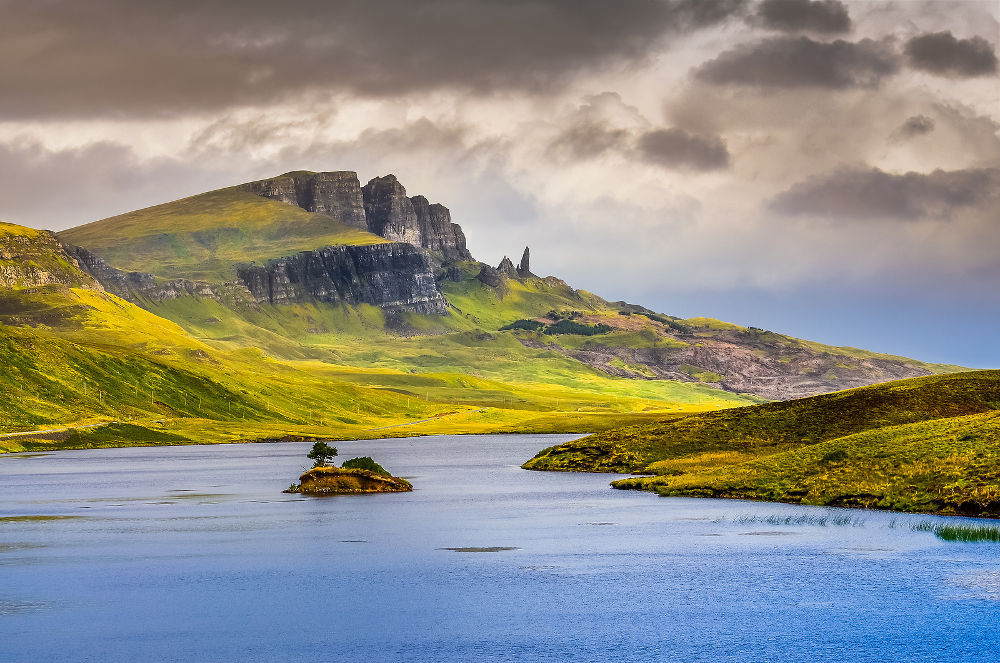 Landscape view of Old Man of Storr rock formation and lake Scotland United Kingdom