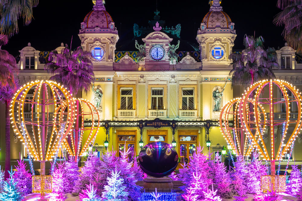 Casino Monte Carlo illuminated by Christmas lights and decorations during the night time