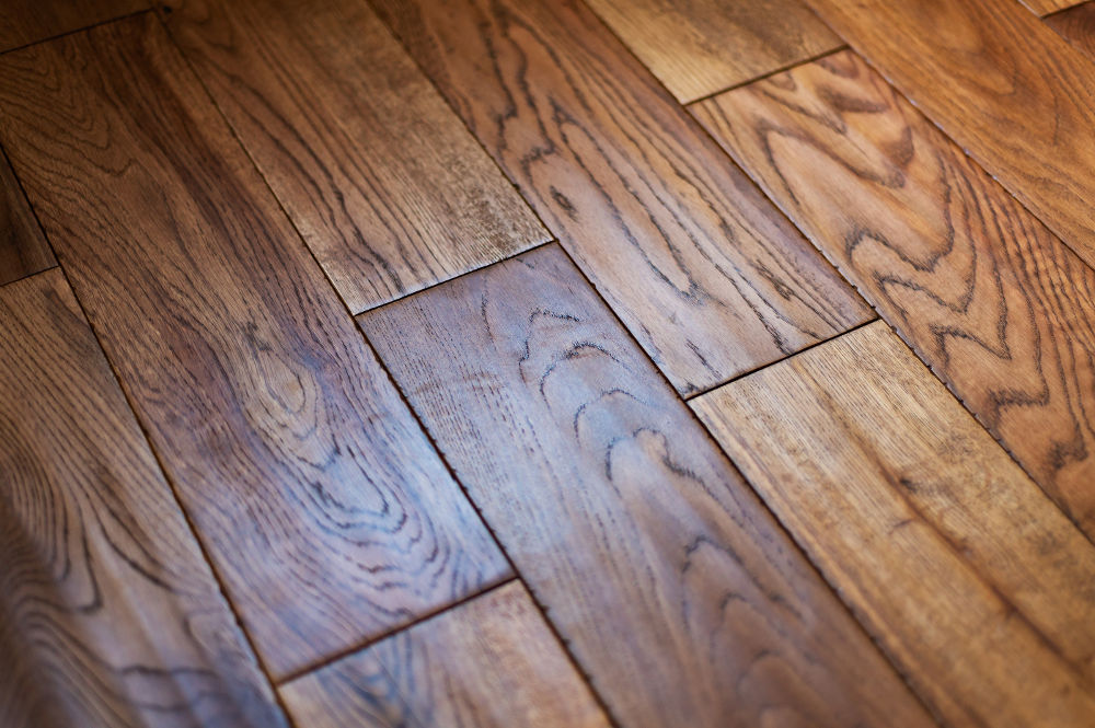 Beautiful golden handscraped oiled European oak brushed for added texture and fine definition of wood grain.