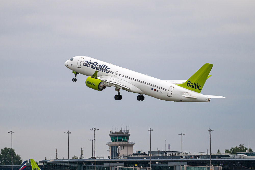 AirBaltic Airbus A220-300 YL-AAS takes off from RIX International Airport on cloudy autumn day