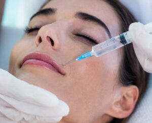 Woman receiving botox injection at spa