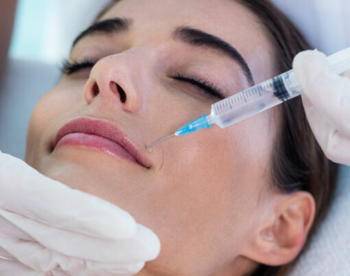 Woman receiving botox injection at spa