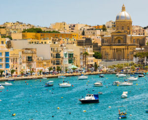 many little yachts and boats from plan wiev to the bay near Valletta in Malta