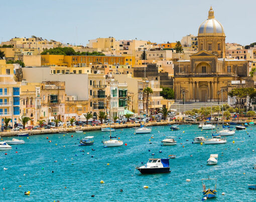 many little yachts and boats from plan wiev to the bay near Valletta in Malta