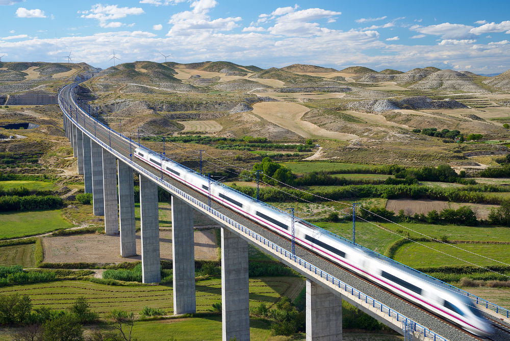 view of a high-speed train crossing a viaduct in Roden, Zaragoza, Aragon, Spain. AVE Madrid Barcelona.