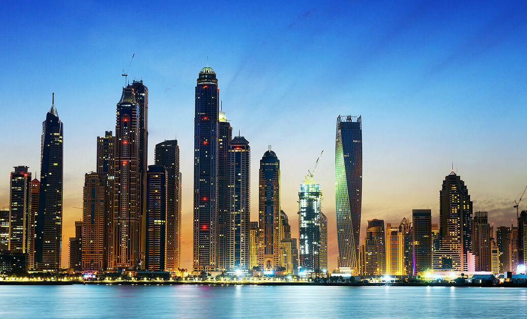 Modern buildings in Dubai Marina by night, Dubai, UAE