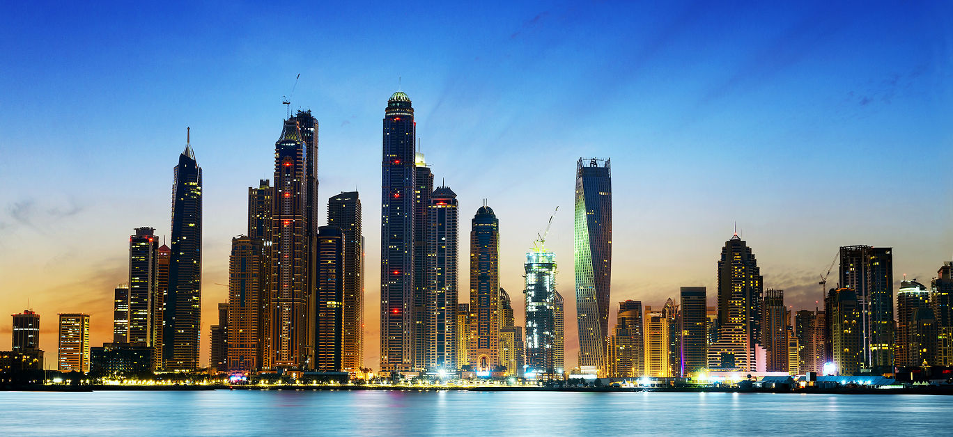 Modern buildings in Dubai Marina by night, Dubai, UAE