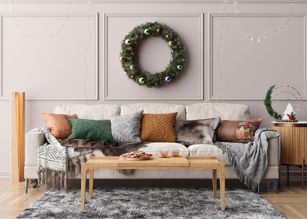 Modern and stylish living room interior with Christmas decorations and sofa